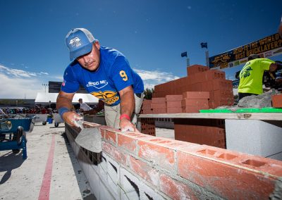 Mario Landeros focused on mortar and brick