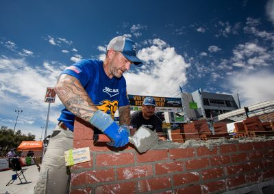 Zac Guire using all his skills to compete for the title of World's Best Bricklayer